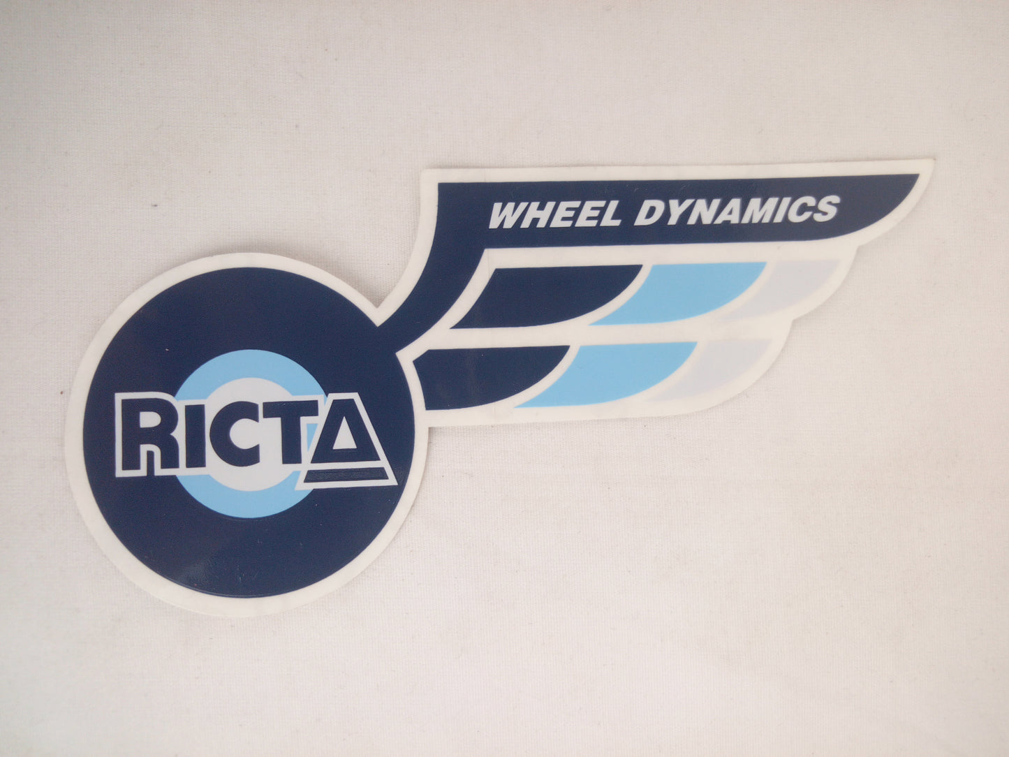 Ricta Wheel Dynamics Wing Clear Blue White 5.75" x 2.25" Vintage NOS Sticker